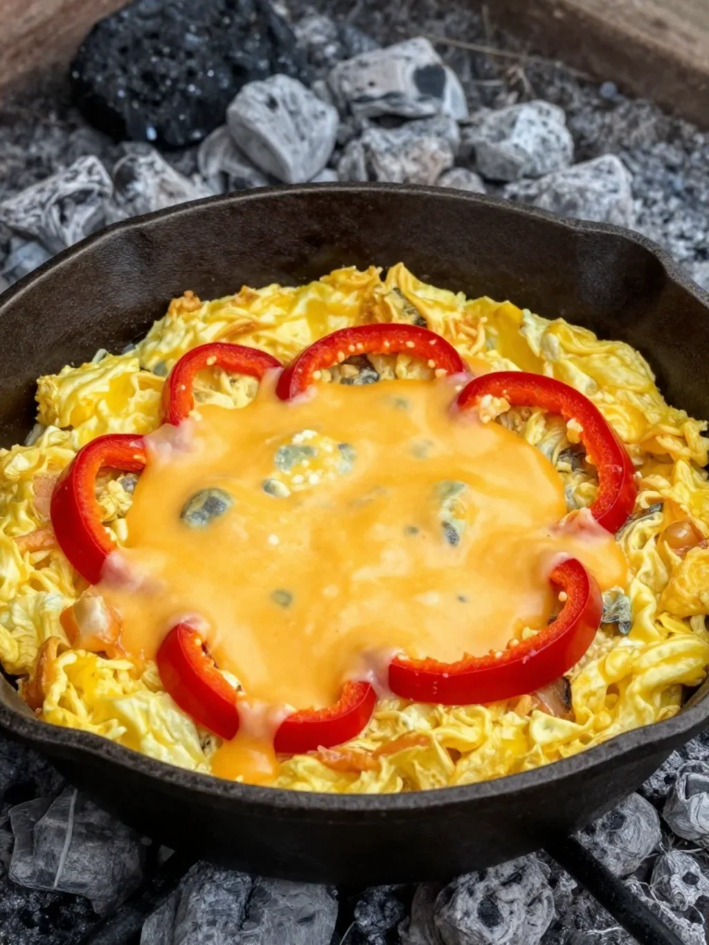 Sculpted Tin Mugs Anchor Wandering Eyelines Near the Sizzling Grate